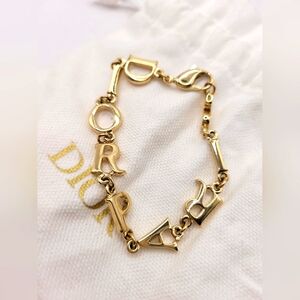 Christian Dior "Dior Paris" Spellout Gold Bracelet